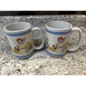 Raggedy Ann and Andy Waving Houston Harvest Cup Mug Coffee Tea Set of 2